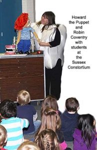 Howard the Puppet and Robin Coventry with students at the Sussex Consortium 