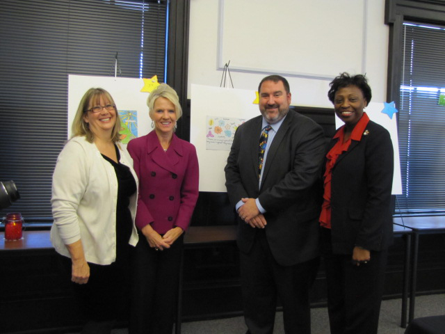 Senator Bethany Long-Hall standing with GACEC staff and others